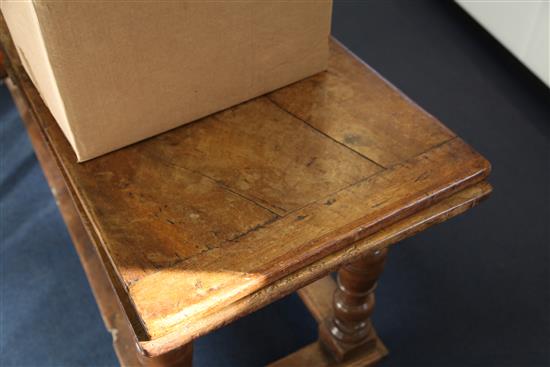 An early 18th century Spanish walnut draw leaf table, 10ft 5in. x 1ft 10in. x 2ft 6in.